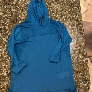 Under Armour. Lightweight 3/4 length sleeves. Size: L. Teal